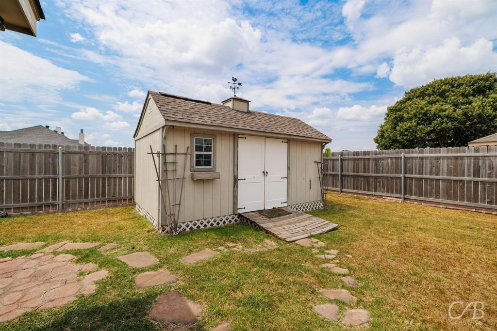 1302 Lewis And Clark Trail Abilene, TX 79602 - Photo 32 of 37 a view of a backyard
