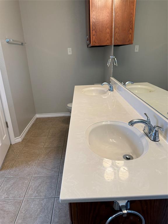 1302 Lewis And Clark Trail Abilene, TX 79602 - Photo 10 of 37 a bathroom with a sink