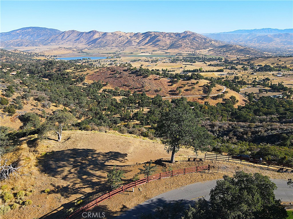 an aerial view of residential house and mountain