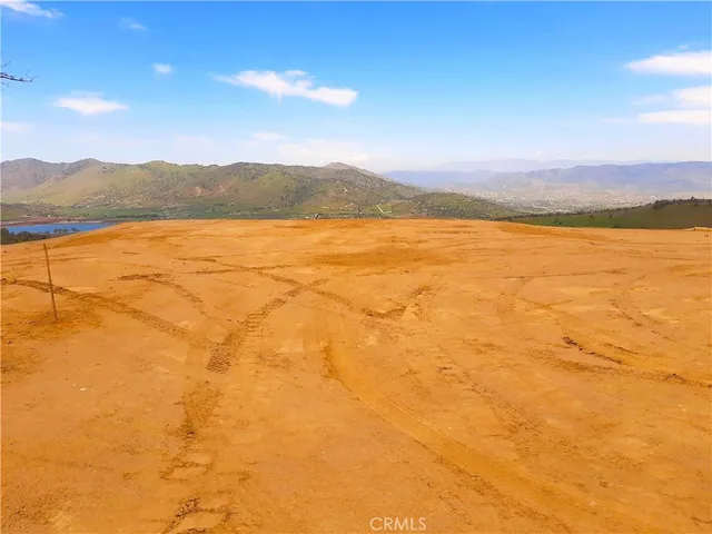 a view of an ocean and a mountain