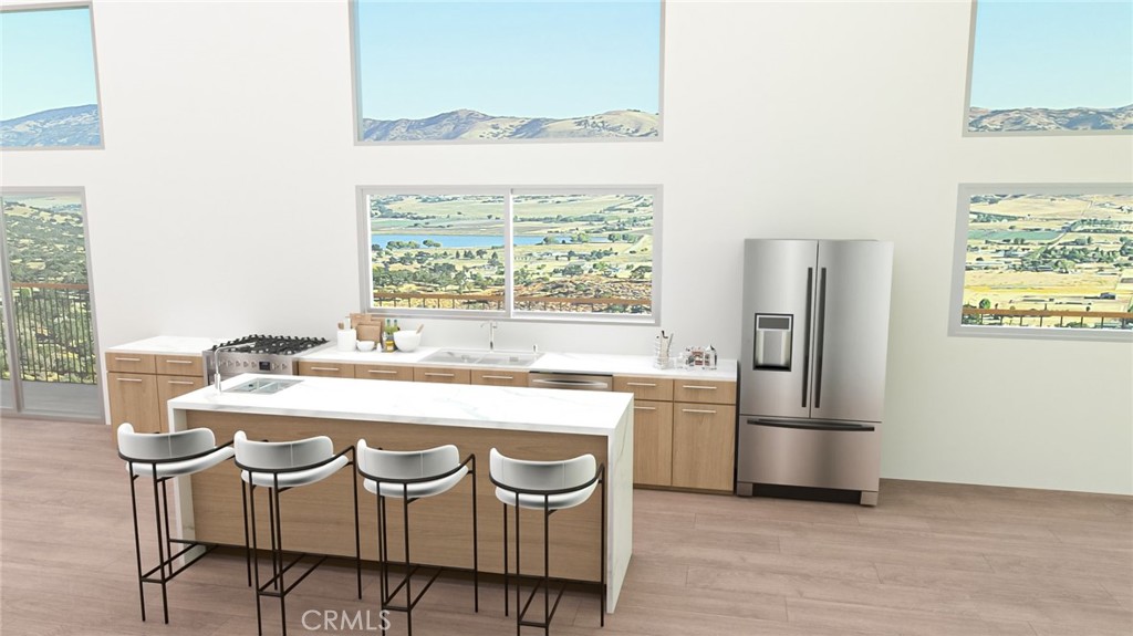 0 Zurich Drive Tehachapi, CA 93561 - Photo 24 of 58 a kitchen with kitchen island a stove and a refrigerator