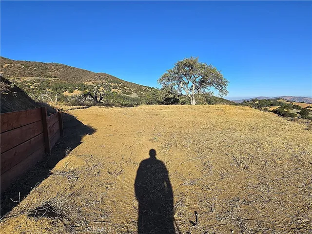 an aerial view of a house with swimming pool