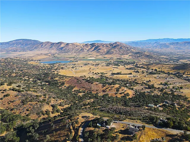 a view of a city with mountains in the background