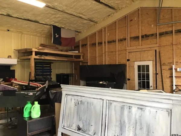 a view of a balcony with chairs
