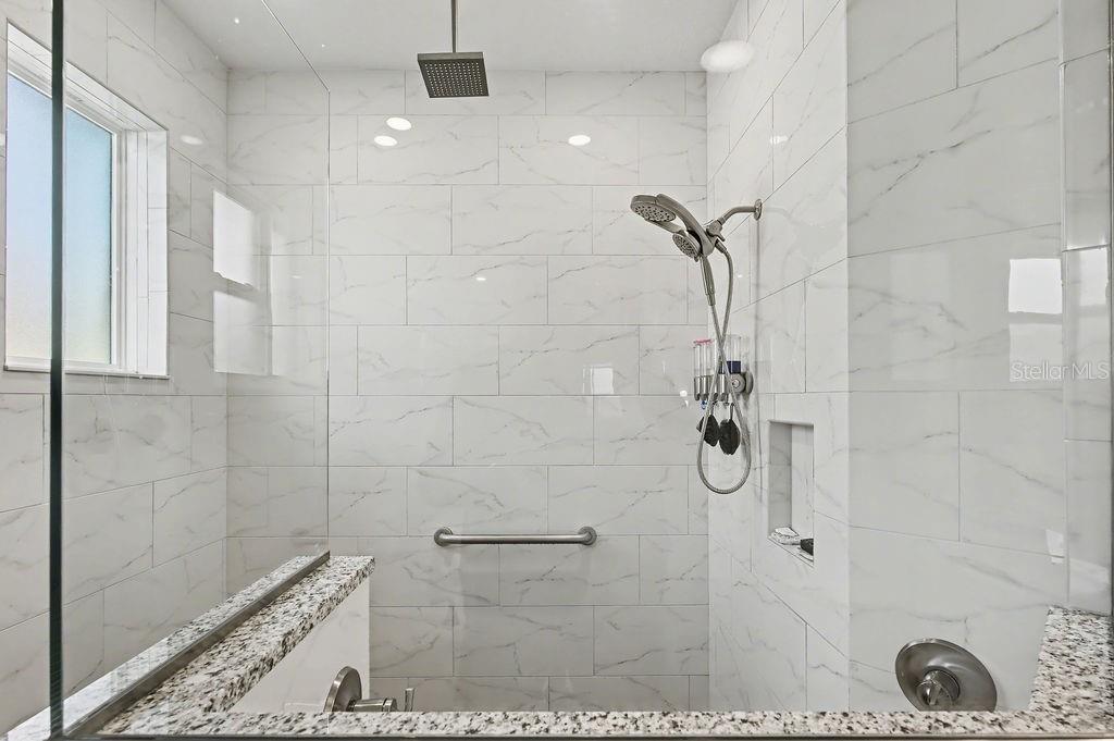 9963 Southwest 82nd Street Road Ocala, FL 34481 - Photo 19 of 43 a bathroom with a shower