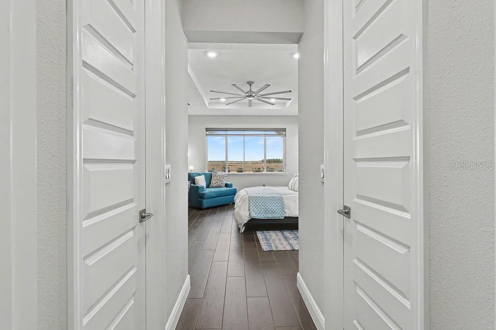 9963 Southwest 82nd Street Road Ocala, FL 34481 - Photo 21 of 43 a view of a hallway and a livingroom with a furniture