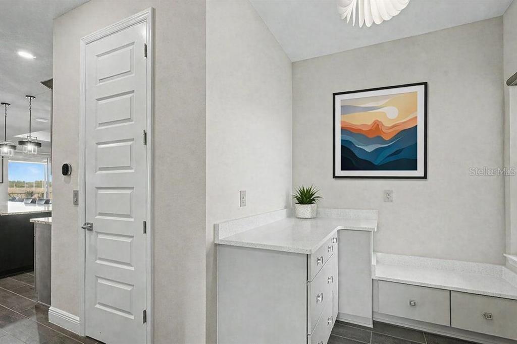 9963 Southwest 82nd Street Road Ocala, FL 34481 - Photo 26 of 43 a bathroom with a sink a vanity and a mirror