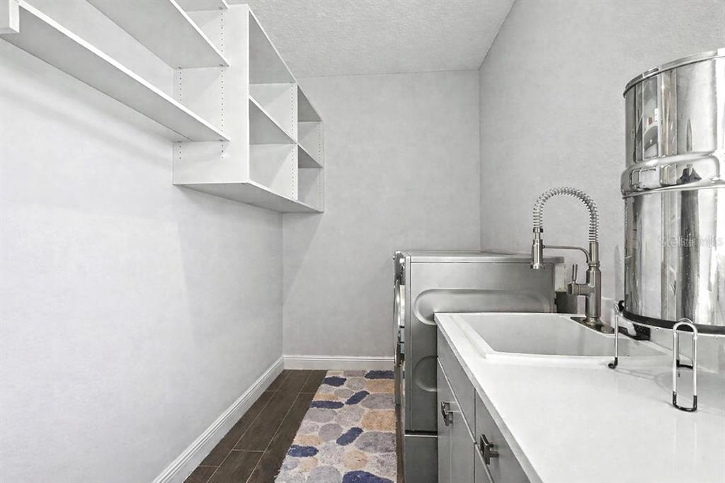 9963 Southwest 82nd Street Road Ocala, FL 34481 - Photo 31 of 43 a bathroom with a sink and a mirror