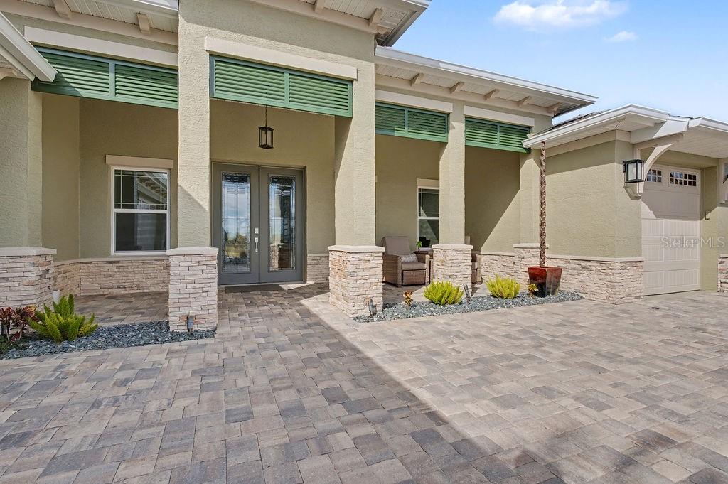 9963 Southwest 82nd Street Road Ocala, FL 34481 - Photo 39 of 43 a view of a house with backyard and sitting area