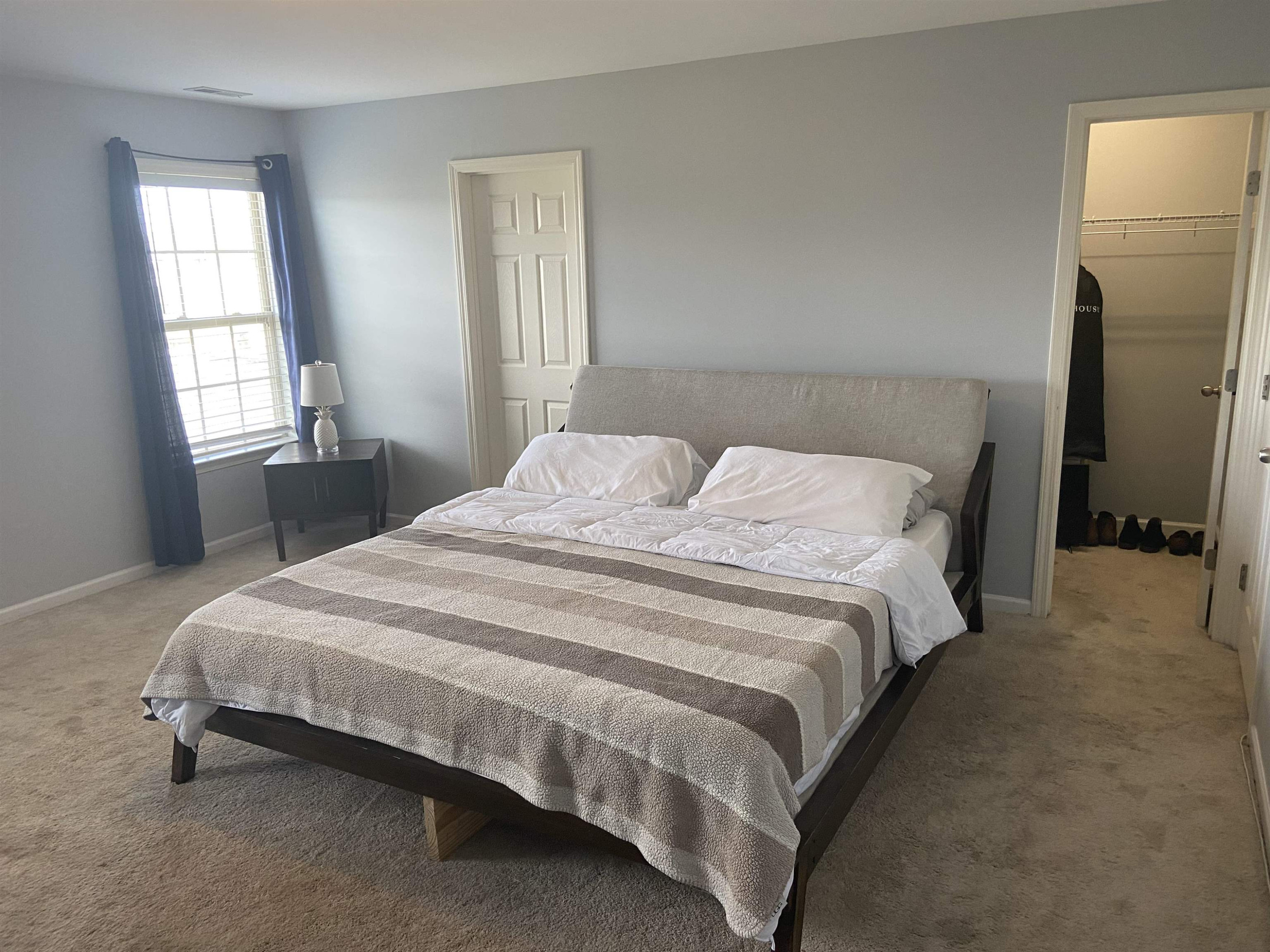 95 Red Coat Drive Cameron, NC 28326 - Photo 17 of 35 a bedroom with a bed and window