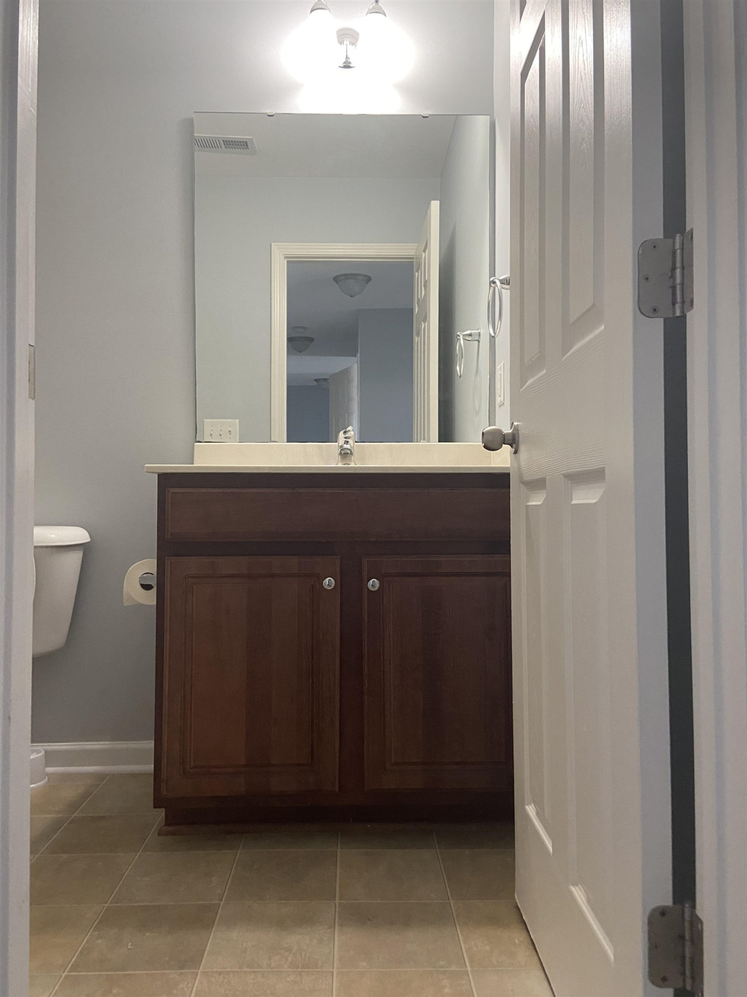 95 Red Coat Drive Cameron, NC 28326 - Photo 30 of 35 a bathroom with a sink and a mirror