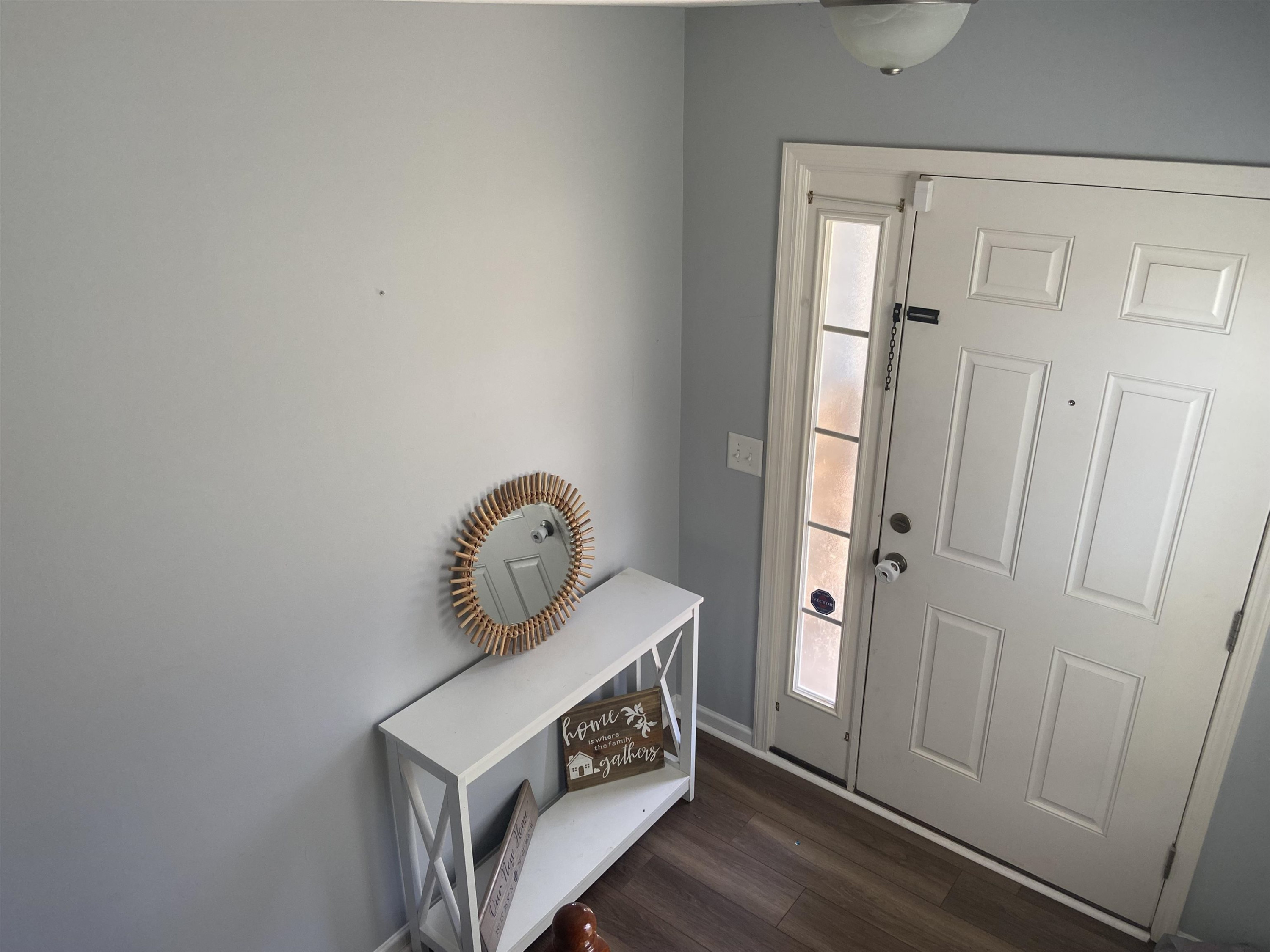 95 Red Coat Drive Cameron, NC 28326 - Photo 3 of 35 a view of an entryway with wooden floor