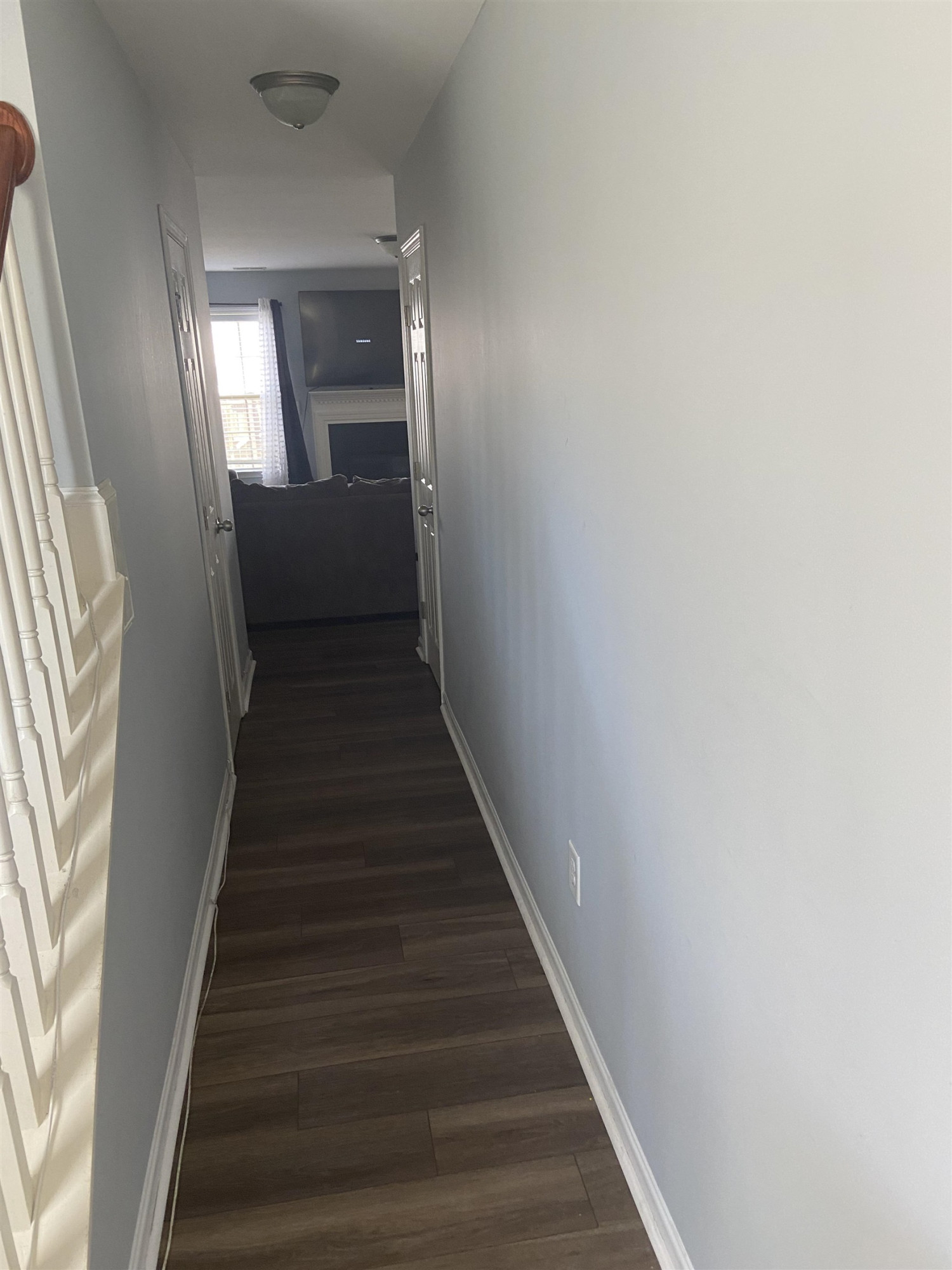 95 Red Coat Drive Cameron, NC 28326 - Photo 5 of 35 a view of a hallway with wooden floor and staircase