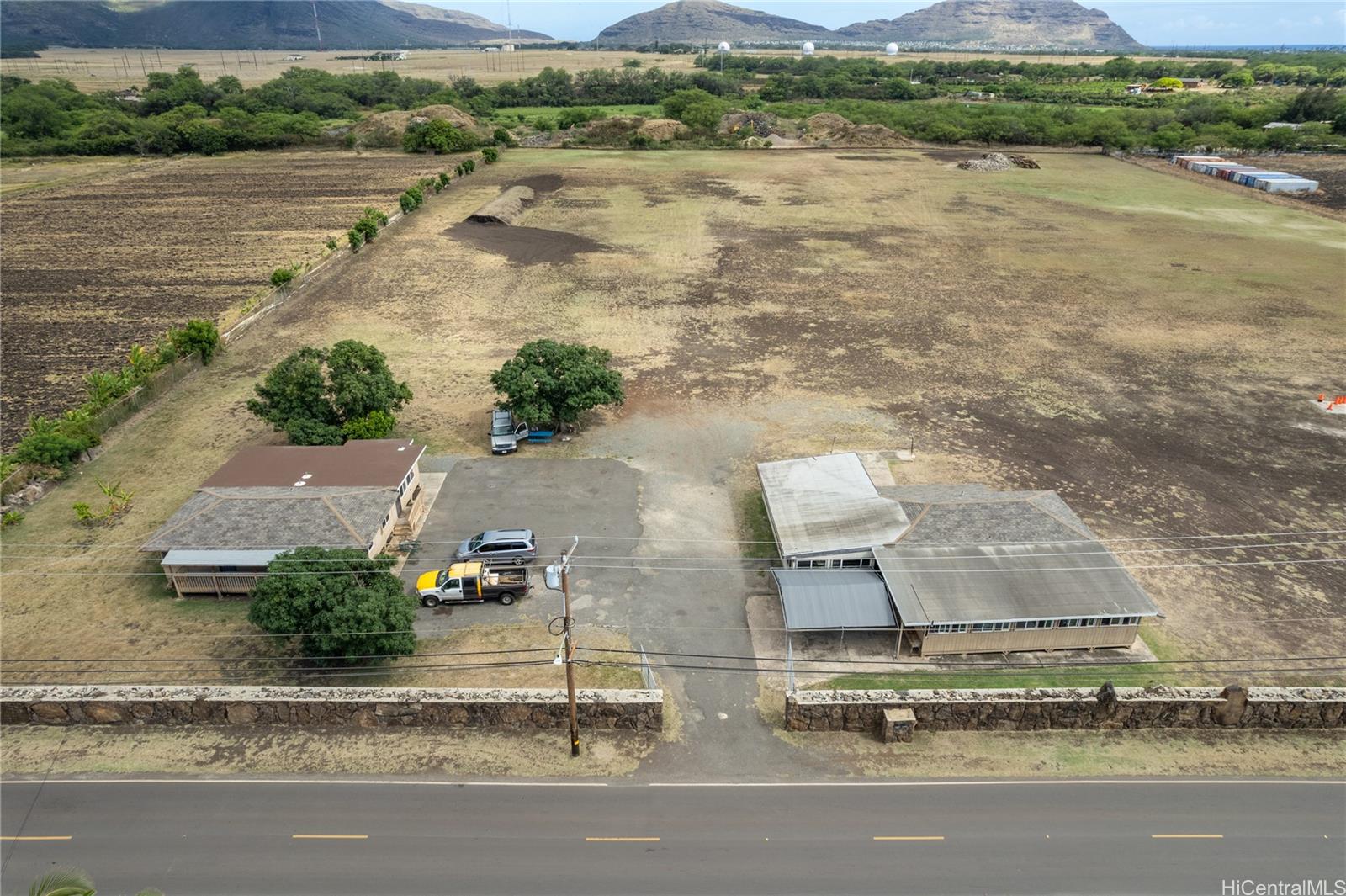 86-441 Halona Road Waianae, HI 96792 - Photo 1 of 1 an aerial view of residential houses with outdoor space and ocean view