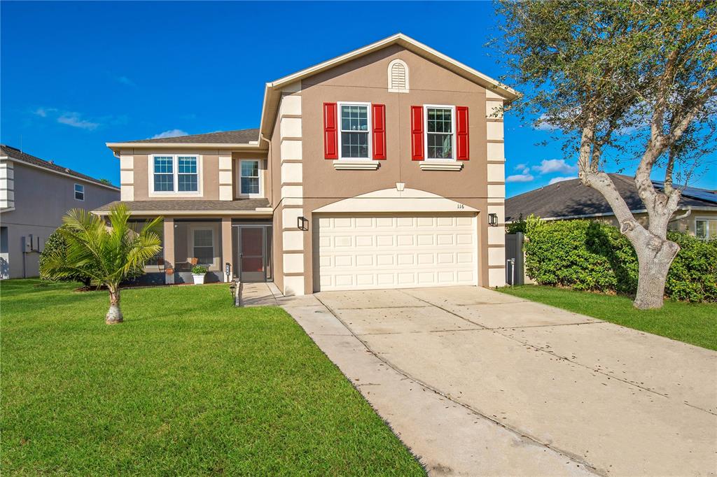 116 Willowbay Ridge Street Sanford, FL 32771 - Photo 1 of 1 a front view of a house with a yard