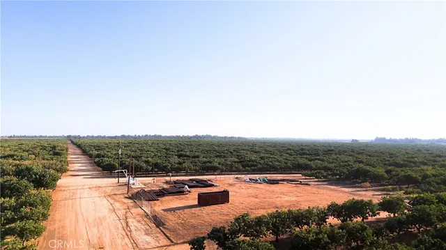 a view of street with parked cars