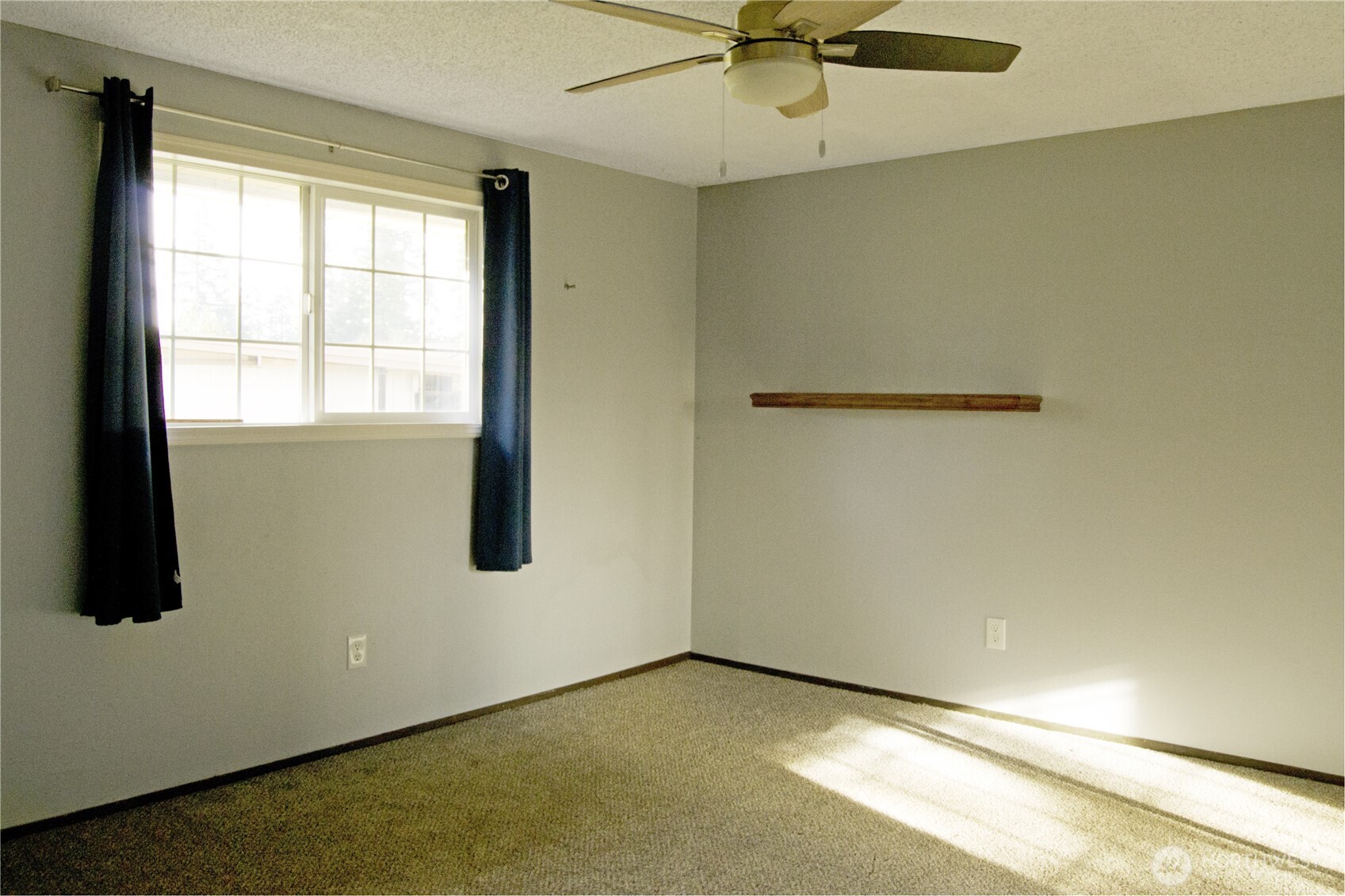 393 Flora Place Forks, WA 98331 - Photo 20 of 26 a view of an empty room with a window