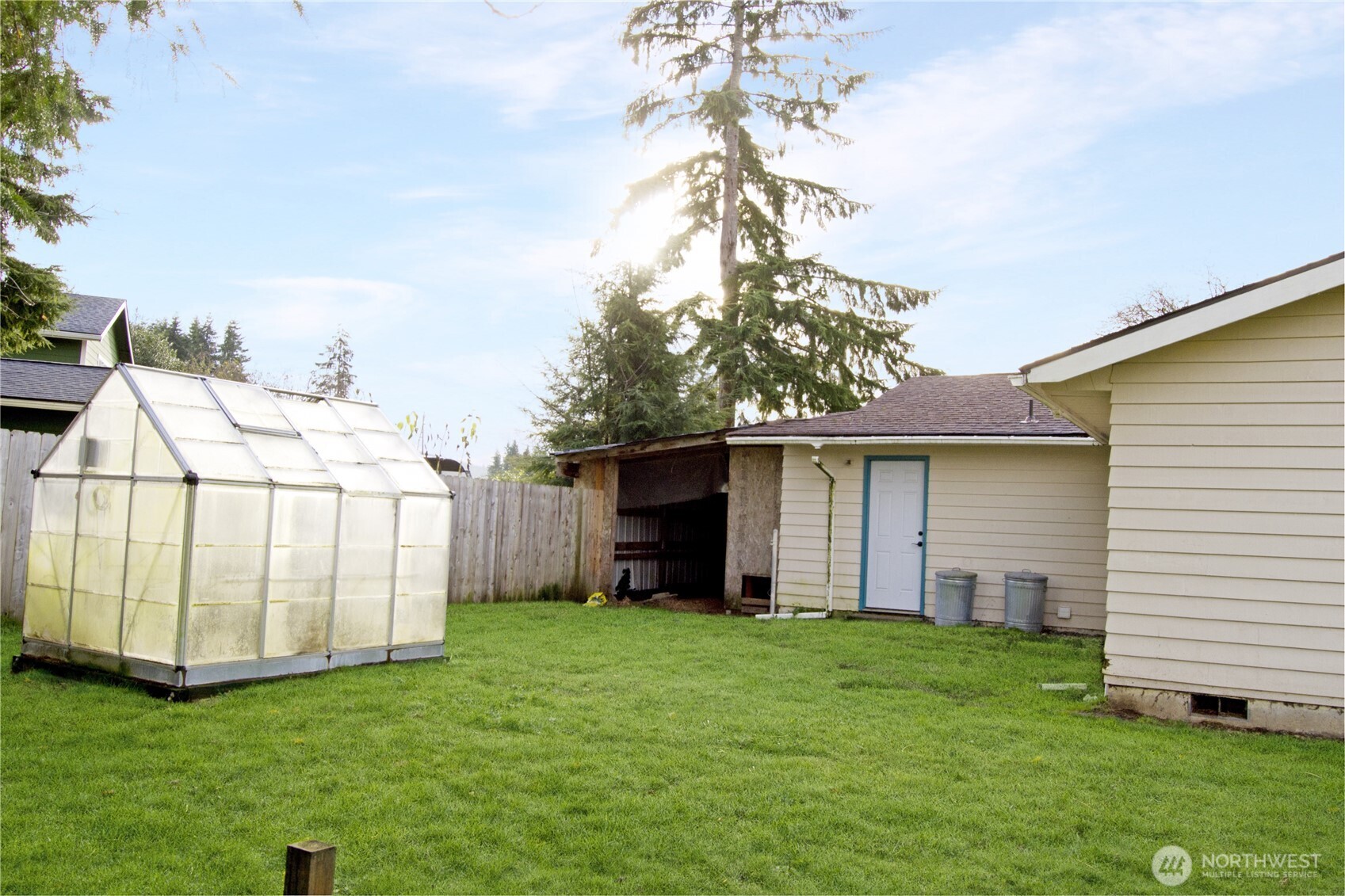 393 Flora Place Forks, WA 98331 - Photo 6 of 26 a view of a back yard of the house