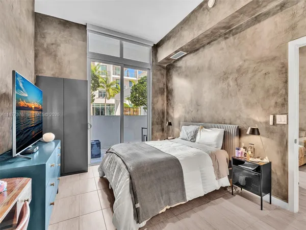 a view of city with ocean