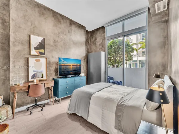 a view of a city with an ocean view