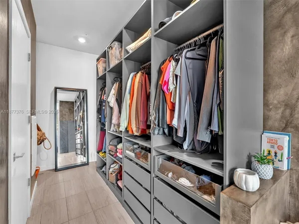 an aerial view of residential building with parking space