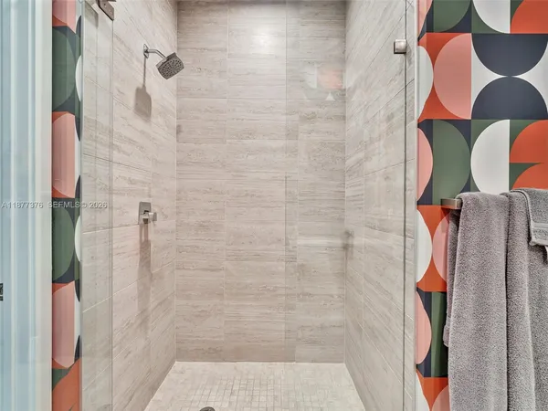 a view of a backyard with a swimming pool