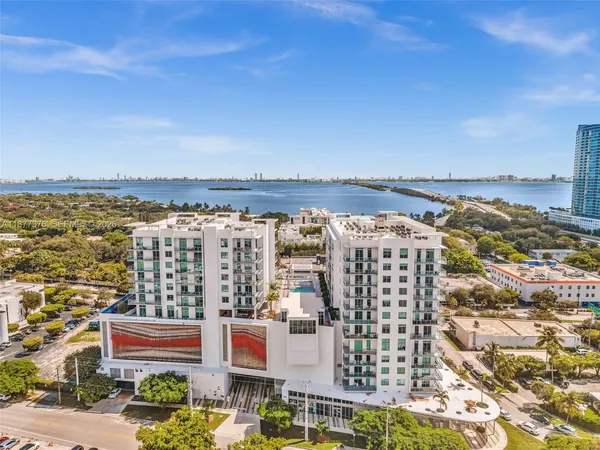 a balcony with furniture and city view