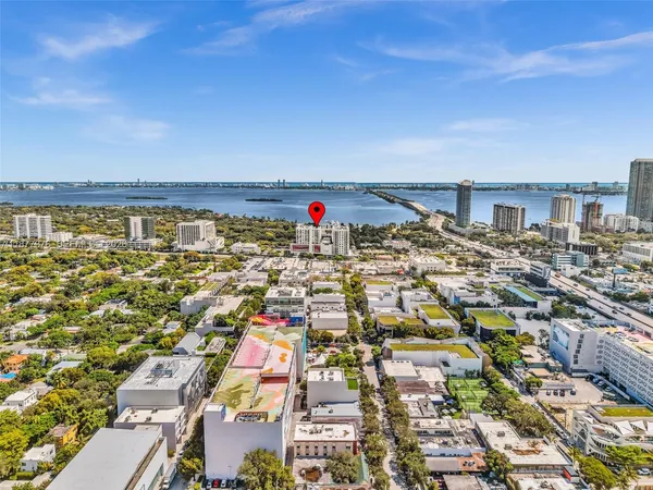 a group of people sitting in front of a building