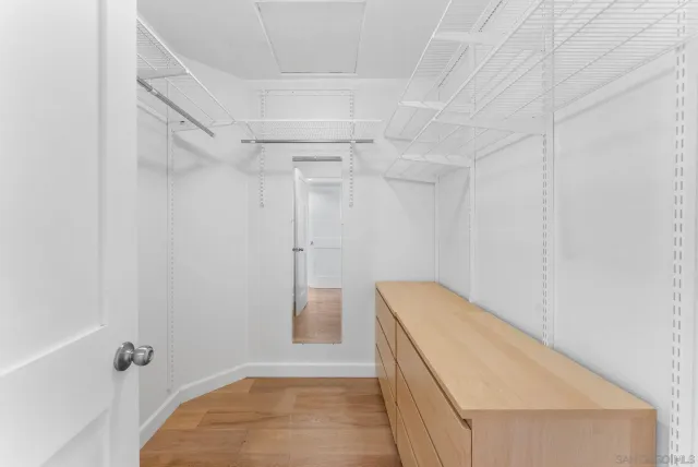 a bathroom with a tub and shower