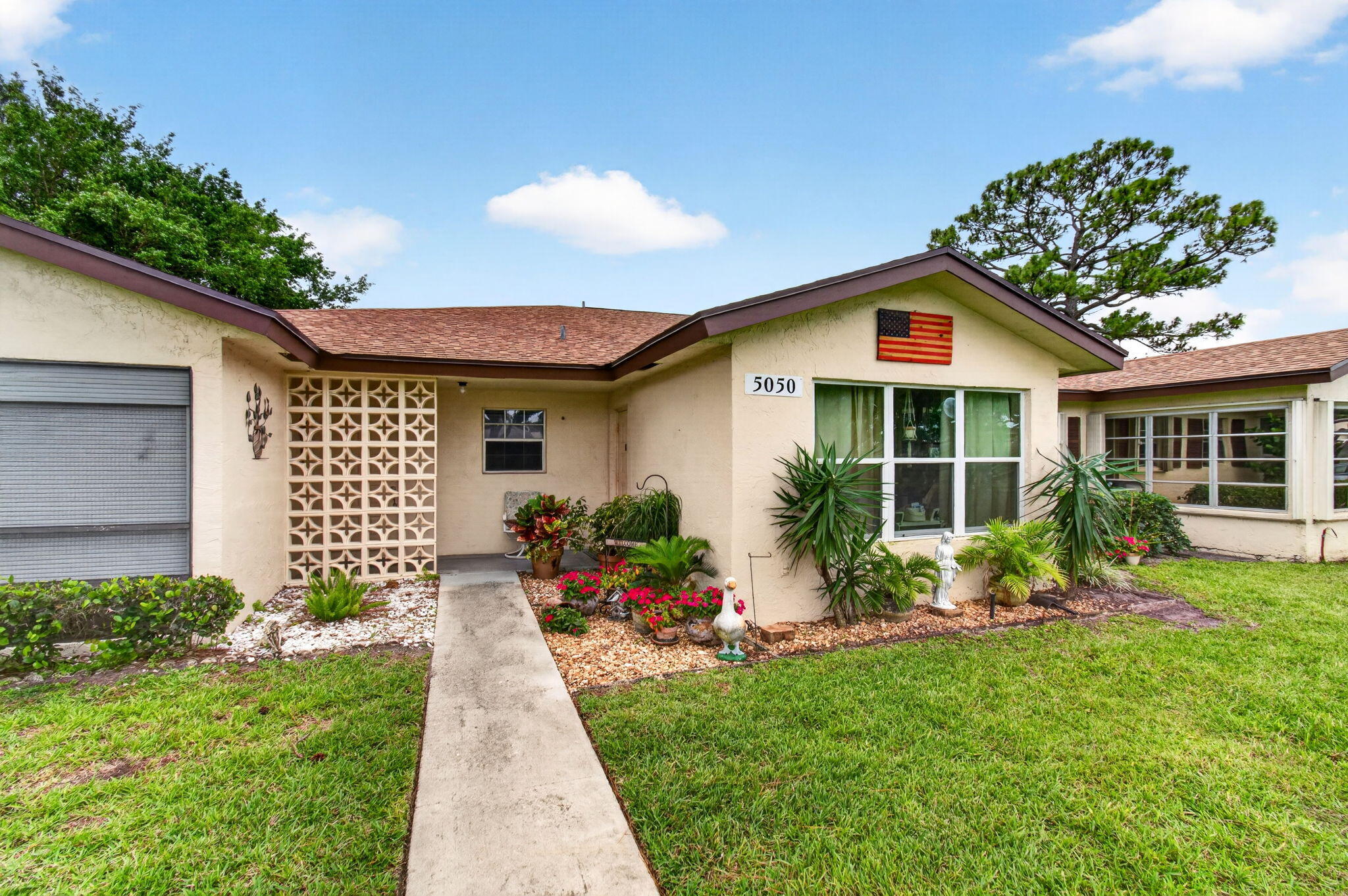 5050 Nesting Way, Unit B Delray Beach, FL 33484 - Photo 2 of 48 4-web-or-mls-DSC_0148