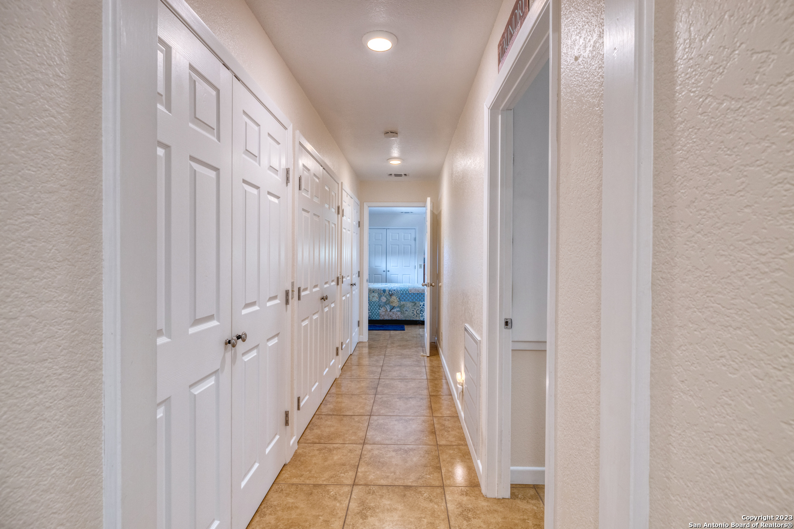 1482 Flatrock Circle Rio Frio, TX 78879 - Photo 12 of 34 a view of a hallway with white doors