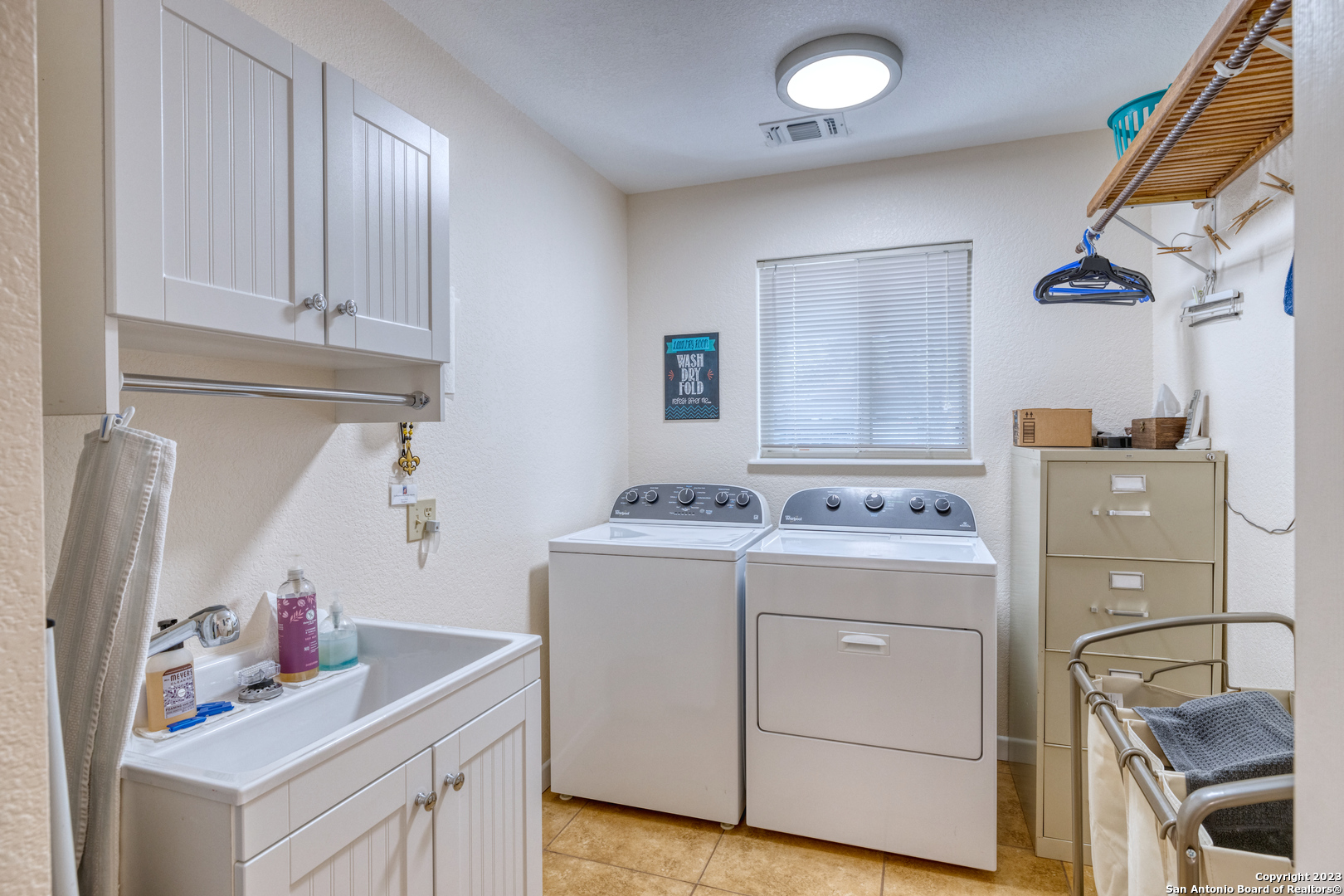 1482 Flatrock Circle Rio Frio, TX 78879 - Photo 13 of 34 a view of storage and utility room with washer and dryer