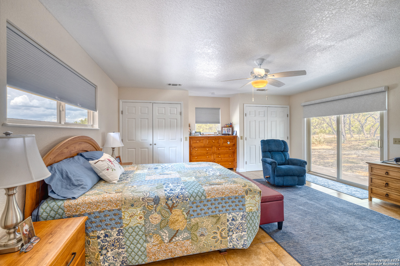 1482 Flatrock Circle Rio Frio, TX 78879 - Photo 14 of 34 a bedroom with a bed and wooden floor