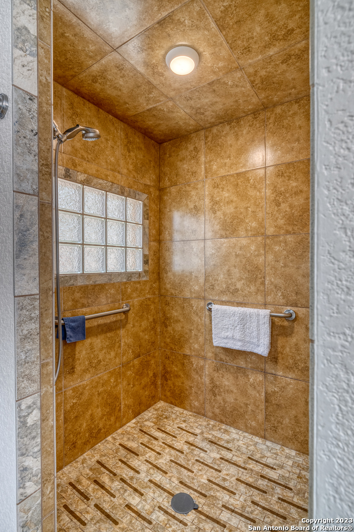 1482 Flatrock Circle Rio Frio, TX 78879 - Photo 16 of 34 a bathroom with a shower