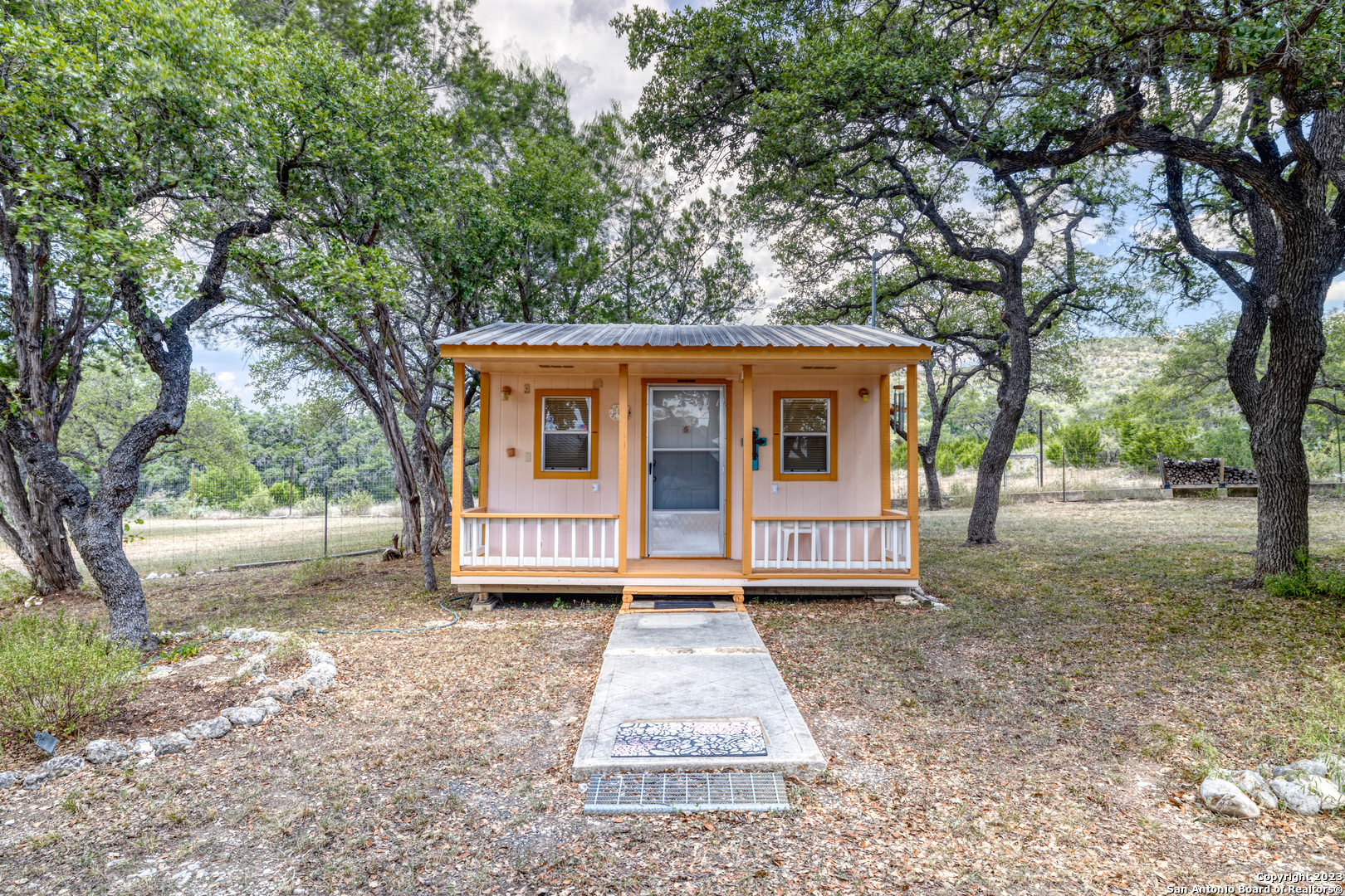 1482 Flatrock Circle Rio Frio, TX 78879 - Photo 22 of 34 a view of a house with a yard