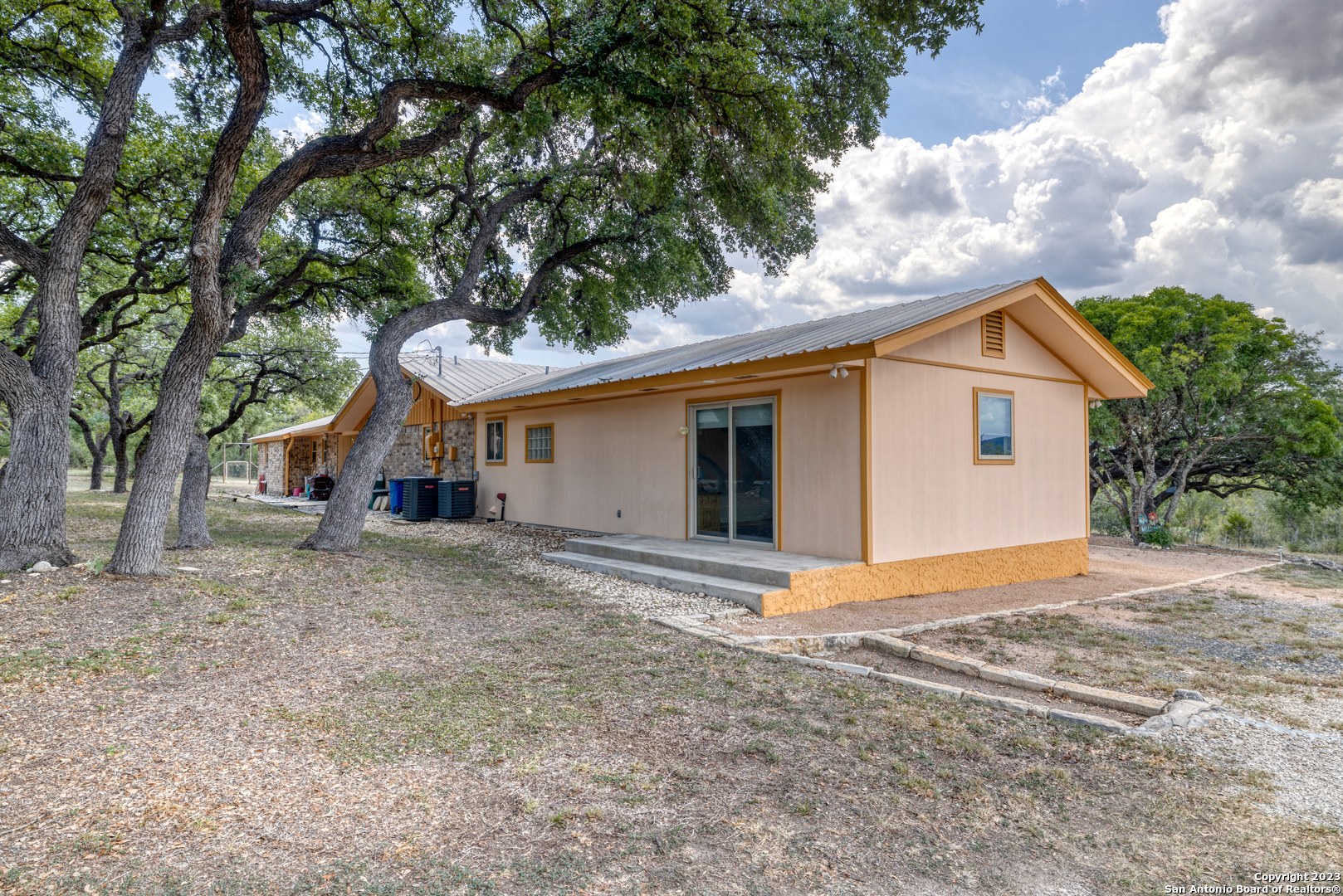 1482 Flatrock Circle Rio Frio, TX 78879 - Photo 24 of 34 a view of a house with a yard