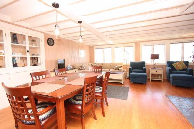 25 Bay View Road Truro, MA 02666 - Photo 14 of 21 a view of a dining room with furniture window and outside view