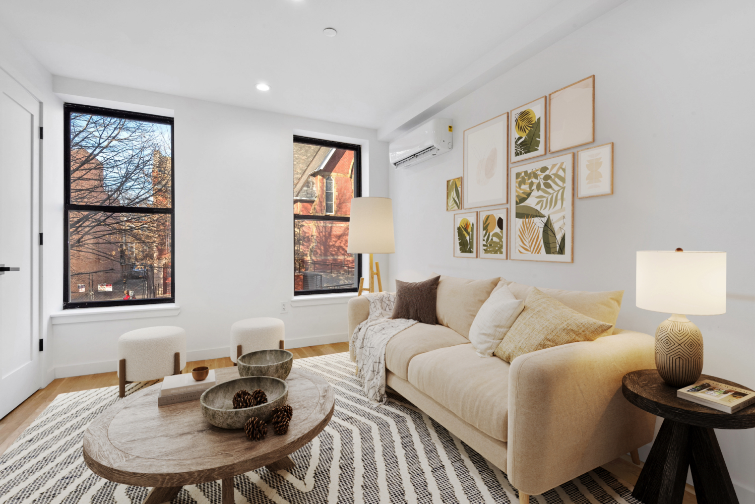 116 Madison Street Brooklyn, NY 11216 - Photo 1 of 6 a living room with furniture and a window