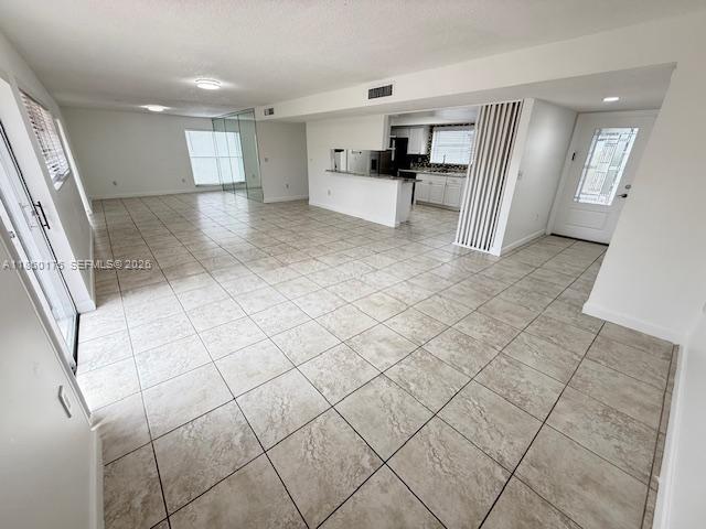 11570 Southwest 83rd Terrace Miami, FL 33173 - Photo 11 of 27 a view of a electric appliances and cabinets in a room