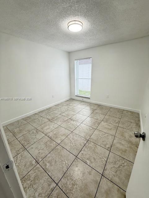 11570 Southwest 83rd Terrace Miami, FL 33173 - Photo 16 of 27 an empty room with a outdoor space