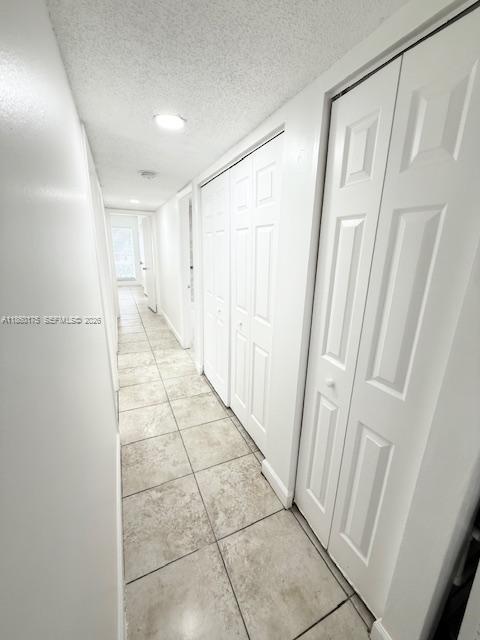 11570 Southwest 83rd Terrace Miami, FL 33173 - Photo 17 of 27 a view of a hallway