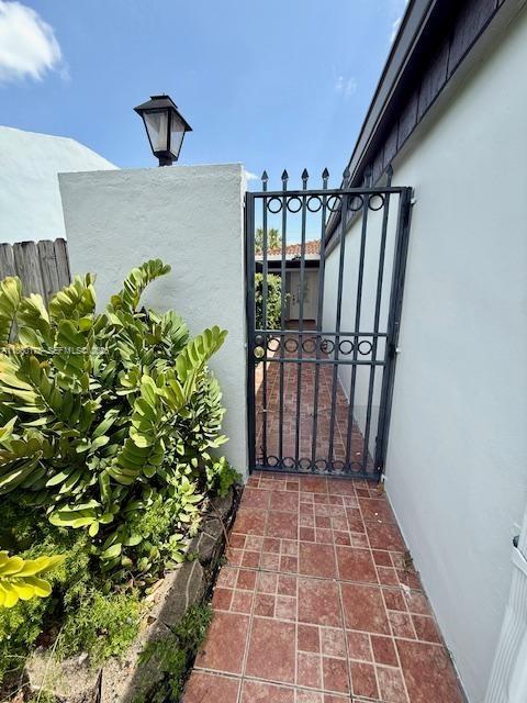 11570 Southwest 83rd Terrace Miami, FL 33173 - Photo 3 of 27 a view of entryway with wooden floor