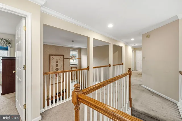 a view of a hallway with entryway