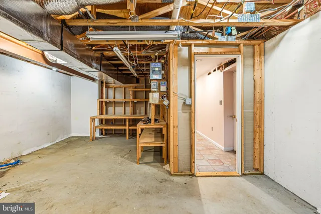 a view of a room with wooden walls