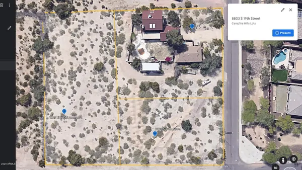 a bathroom with a toilet and a shower curtain