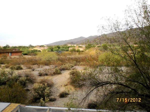 a view of lake with mountain