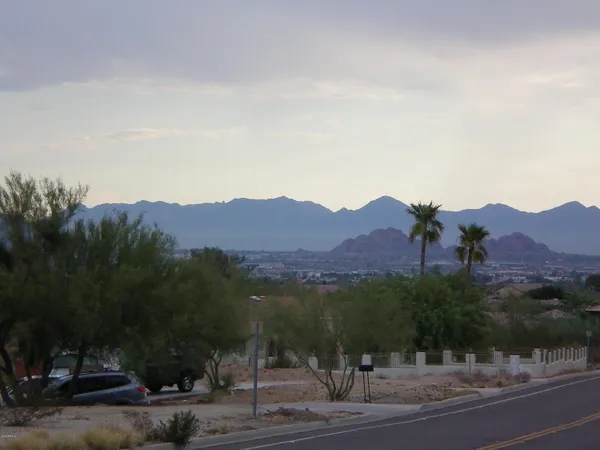 a view of a city with a mountain