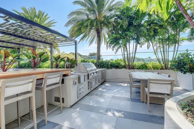 a view of a patio with swimming pool