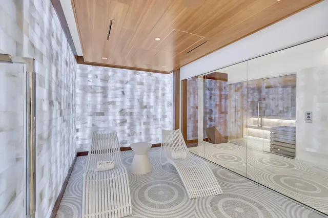 a spacious bathroom with a sink and a shower