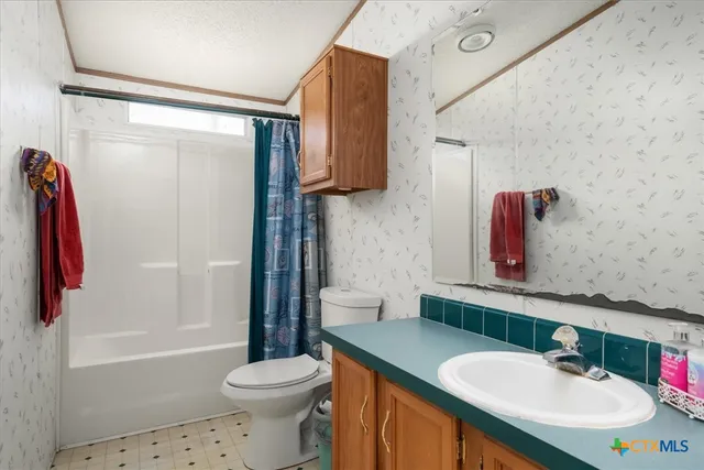 a view of a backyard of a house